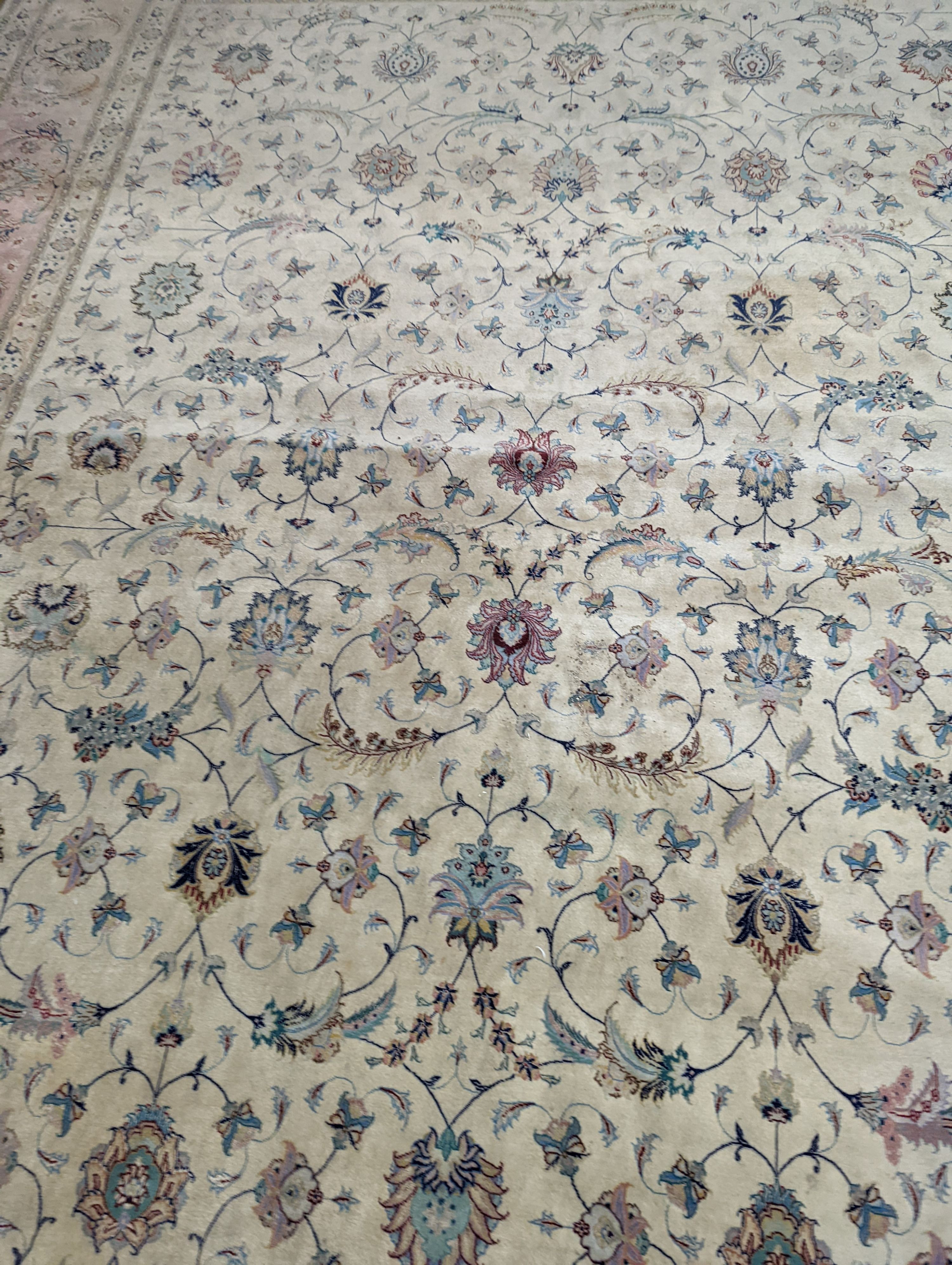 A Persian Tabriz ivory ground carpet, 410 x 300